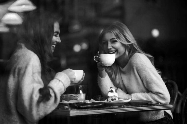 two,girl,friends,drinking,coffee,cafe