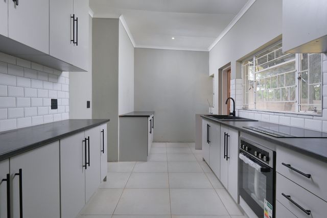 Division 40 vs Division 43: Capital Works and Plant and Equipment Explained » capital works Investment property kitchen showing oven, cabinetry and tiled flooring